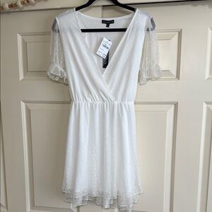 Elegant White Dress with Sheer Sleeves